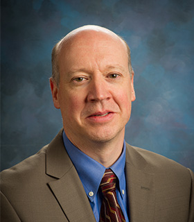 Headshot of Nathan Gage