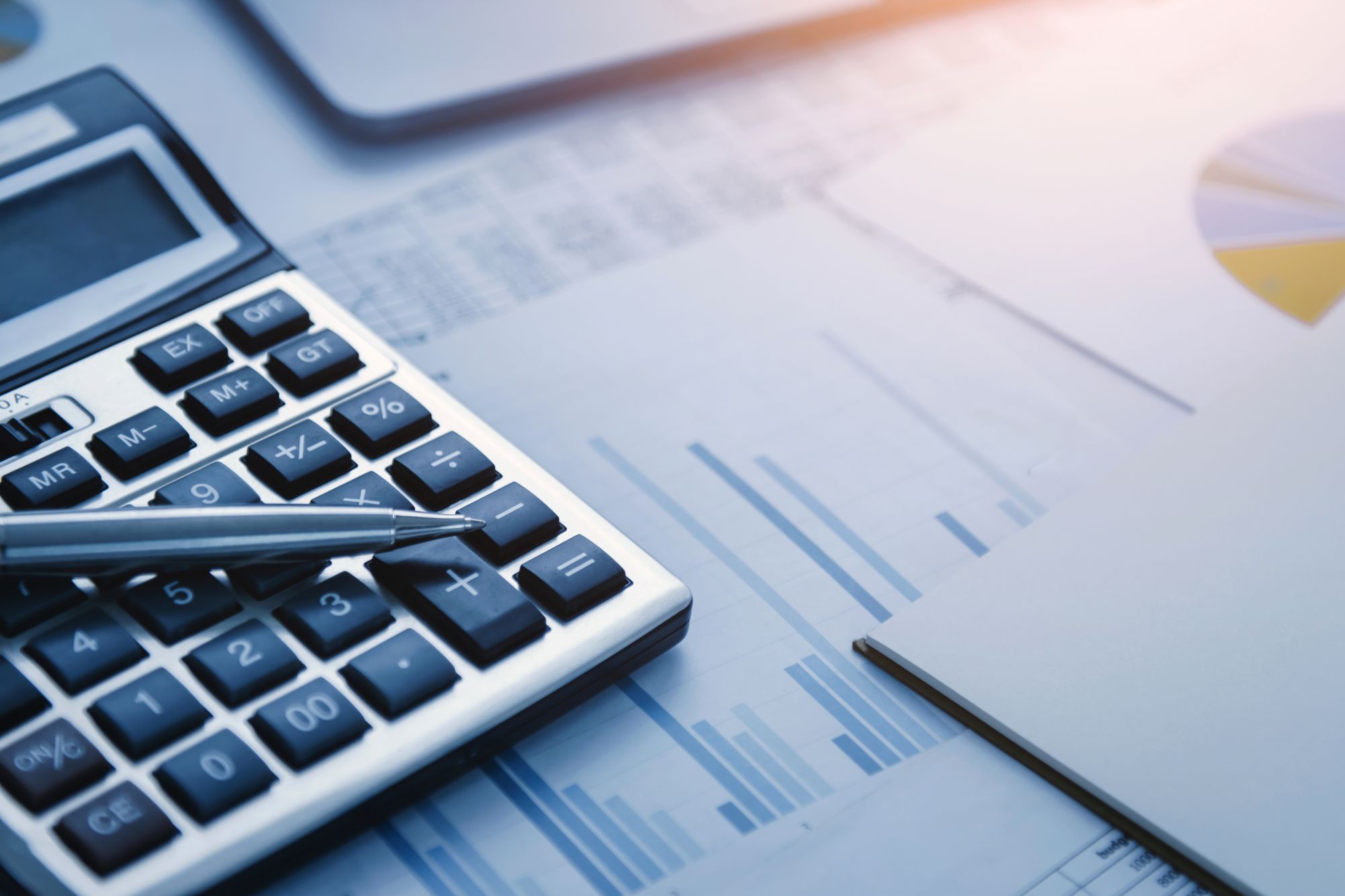 Image of a calculator and graphs