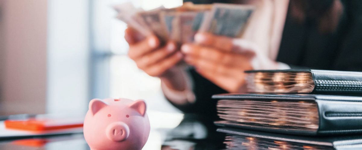 Business woman counting money
